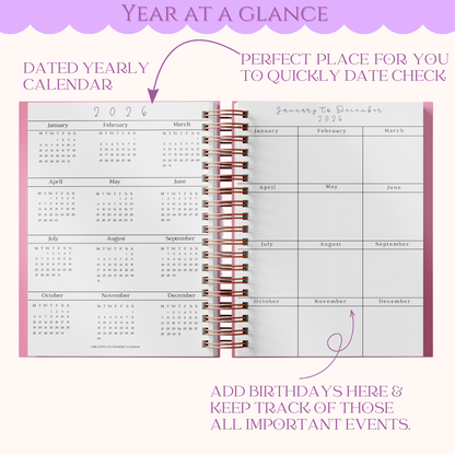 Yearly calendar with spiral binding on a white background